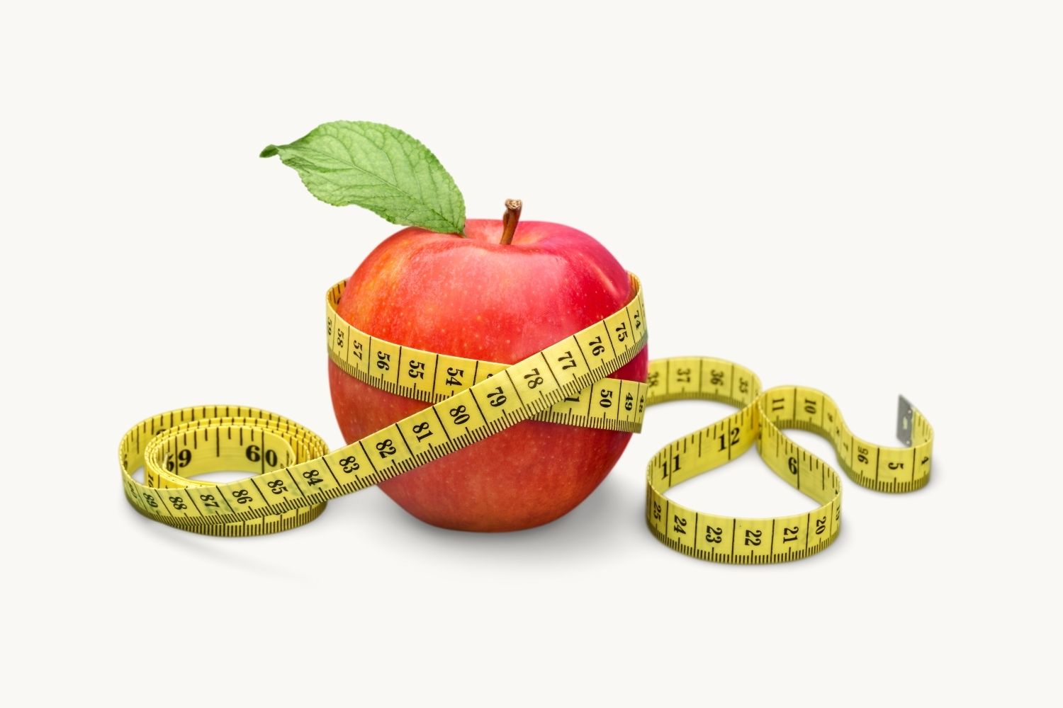 hashimoto und gewichtsprobleme der Apfel mit einem Massband als Symbol fü das Gewichtsproblem